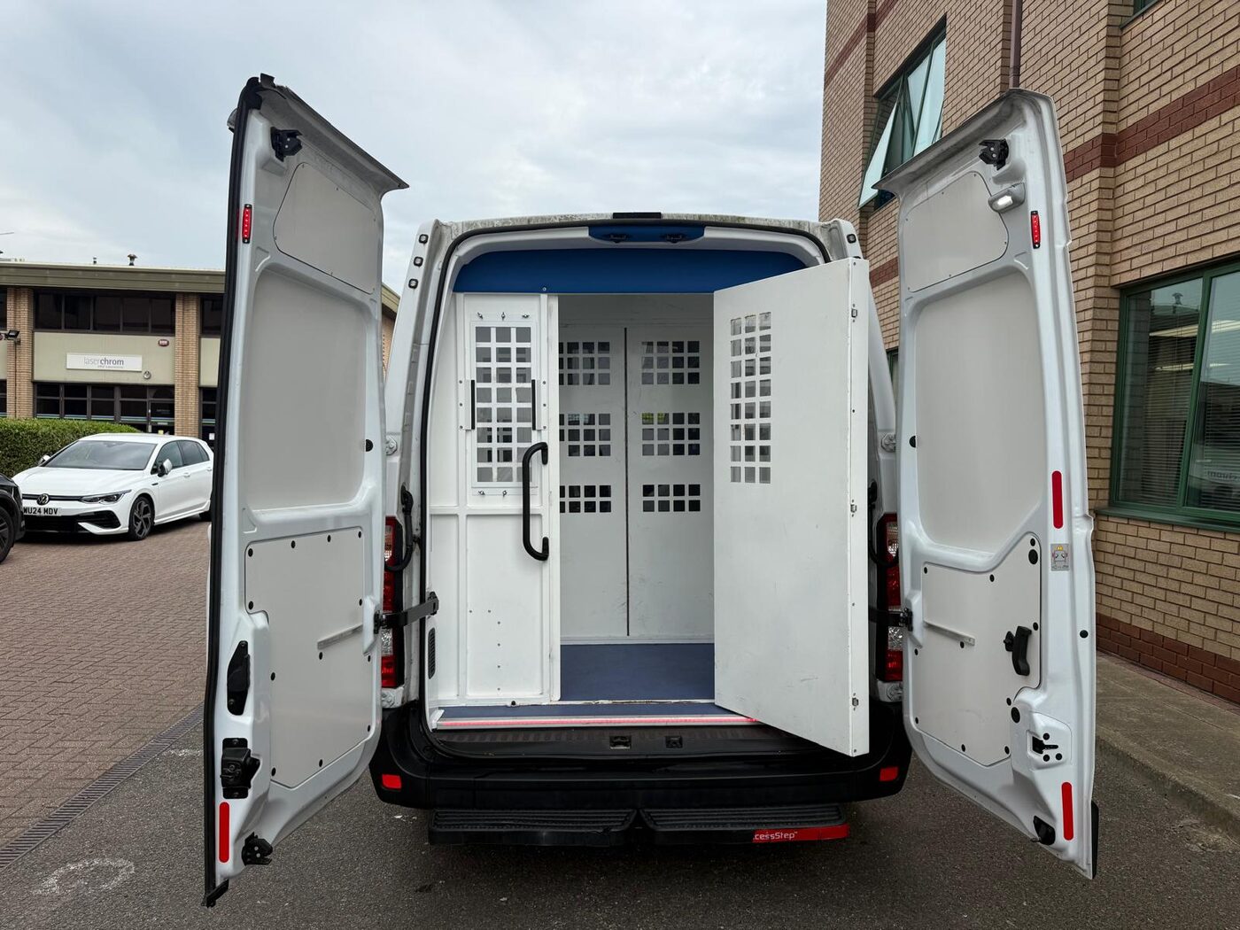 PSS secure ambulance — rear and side secure cages open